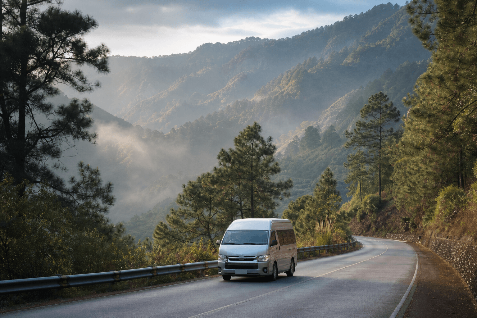 Private van on a mountain road towards Baguio
